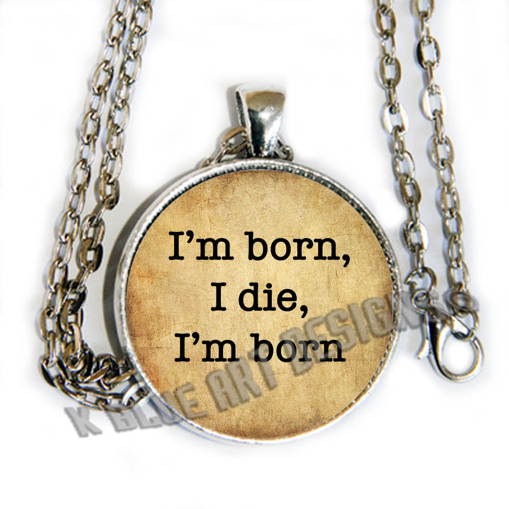 Doctor Who inspired quote says, "I'm born, I die, I'm born." - glass cab pendant necklace